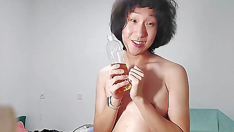 Asian babe with a cute face shows off her body in this video