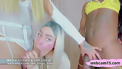 Amateur interracial threesome with a black chick and shemale