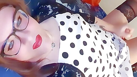 Red-haired blonde gives a blowjob while masturbating